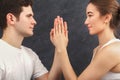 Young couple practicing yoga together in gym Royalty Free Stock Photo