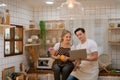 Young couple prepares cooking a breakfast in kitchen Royalty Free Stock Photo