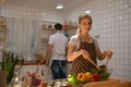 Young couple prepares cooking a breakfast in kitchen Royalty Free Stock Photo