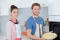 Young couple preparing home-made pie Royalty Free Stock Photo