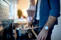 Young couple preparing a meal at the kitchen. Kitchen, housework, quarantin, home Royalty Free Stock Photo