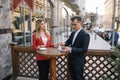 Young couple of professionals chatting during a coffee break Royalty Free Stock Photo