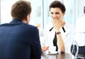 Young couple of professionals chatting during coffee break Royalty Free Stock Photo