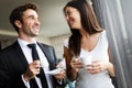 Young couple of professionals chatting during a coffee break Royalty Free Stock Photo