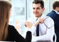 Young couple of professionals chatting during a coffeebreak Royalty Free Stock Photo