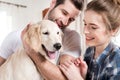 Young couple with puppy Royalty Free Stock Photo