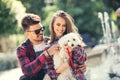 Young couple with puppy. Royalty Free Stock Photo