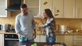 Young couple quarrels in the kitchen at home Royalty Free Stock Photo