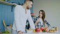 Young couple quarrels in the kitchen at home Royalty Free Stock Photo