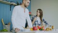 Young couple quarrels in the kitchen at home Royalty Free Stock Photo