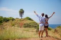 Young couple with raised hands Royalty Free Stock Photo