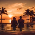 Young Couple Relaxing and Enjoying the Sunset