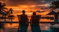 Young Couple Relaxing and Enjoying the Sunset Royalty Free Stock Photo