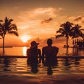 Young Couple Relaxing and Enjoying the Sunset Royalty Free Stock Photo