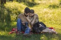 young couple looking at photos on a camera Royalty Free Stock Photo