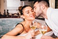 Young couple relaxing together and drinking white wine Royalty Free Stock Photo