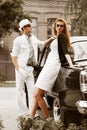 Young couple with a retro car Royalty Free Stock Photo