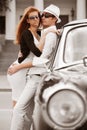 Young couple with a retro car Royalty Free Stock Photo