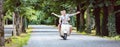 Young couple on retro scooter Royalty Free Stock Photo