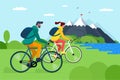 Young couple riding bicycles in mountains. Boy and girl bicyclists with backpacks on bikes travel in nature. Male and Royalty Free Stock Photo