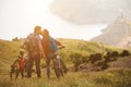 Young couple riding bikes in the mountains Royalty Free Stock Photo