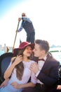 A young couple riding a gondola in Venice. Italy Royalty Free Stock Photo