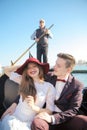 A young couple riding a gondola in Venice. Italy Royalty Free Stock Photo