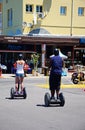 Couple riding segways, Vilamoura.