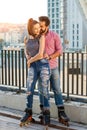 Young couple on rollerblades. Royalty Free Stock Photo