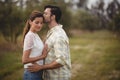 Young couple romancing on field at farm Royalty Free Stock Photo