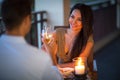 Young couple with a romantic dinner with candles Royalty Free Stock Photo