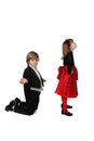 Young couple in satirical lover's fighting pose Royalty Free Stock Photo