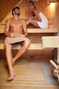 Young couple in sauna Royalty Free Stock Photo