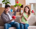 Young couple saving money for baby to be born Royalty Free Stock Photo