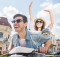 Young couple on scooter Royalty Free Stock Photo