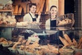 Young couple selling pastry and loaves