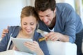 Young couple shopping on internet Royalty Free Stock Photo