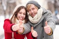 Young couple showing thumbs up Royalty Free Stock Photo