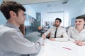 Young couple signing contract documents on partners back Royalty Free Stock Photo