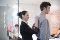 Young couple signing contract documents on partners back Royalty Free Stock Photo