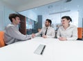 Young couple signing contract documents on partners back Royalty Free Stock Photo