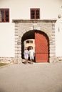 Young couple siteseeing on a hot summer afternoon on a paved street