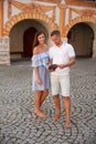 Young couple siteseeing on a hot summer afternoon on a paved street