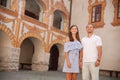 Young couple siteseeing on a hot summer afternoon on a paved street