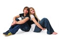 Young couple siting on the floor and smiling Royalty Free Stock Photo