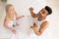 Young Couple Sitting In Bed, Happy Smile Woman Show Excited Screaming Surprised Man Positive Pregnancy Test Royalty Free Stock Photo