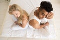 Young Couple Sitting In Bed, Having Conflict Relationships Problem, Sad Negative Emotions Hispanic Man And Woman Royalty Free Stock Photo