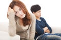 Young Couple sitting on the sofa during conflict Royalty Free Stock Photo