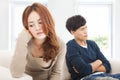 Young Couple sitting on the sofa during conflict Royalty Free Stock Photo