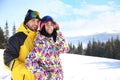 Young couple at ski resort. Winter vacation Royalty Free Stock Photo